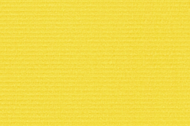 Yellow cardboard texture. Craft paper background.