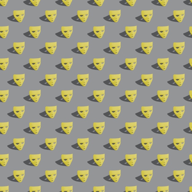 Yellow Carnival masks on gray background