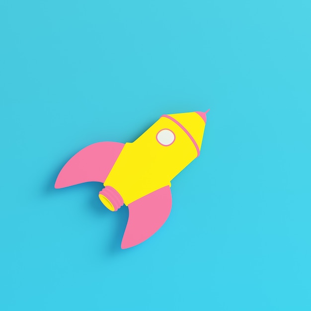 Yellow cartoon styled rocket on bright blue background in pastel colors. Minimalism concept. 3d render