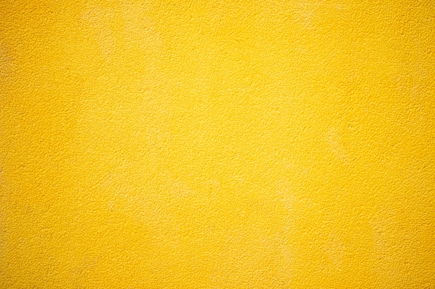 yellow cement or concrete wall texture for background
