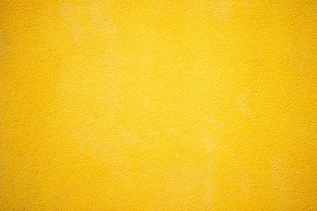 Yellow cement or concrete wall texture for background