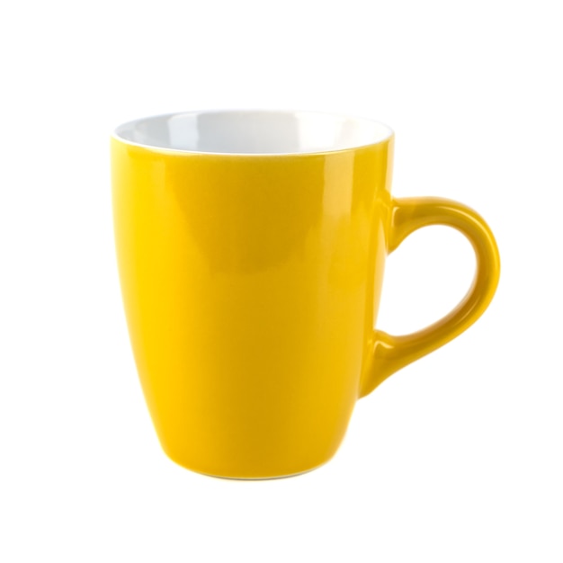 Photo yellow ceramic cups on a white background.