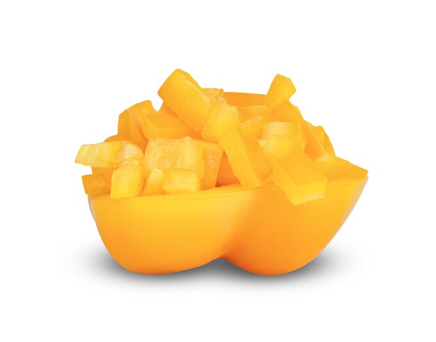 Yellow chopped sweet bell pepper isolated on white background