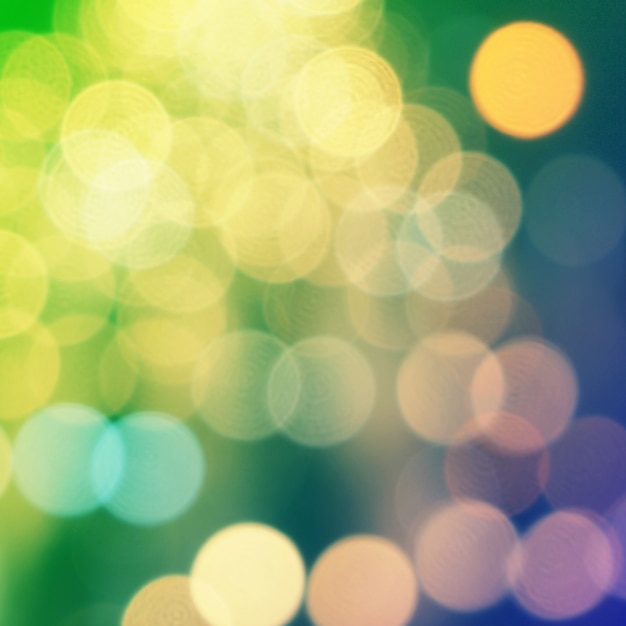 Yellow christmas background with bokeh lights