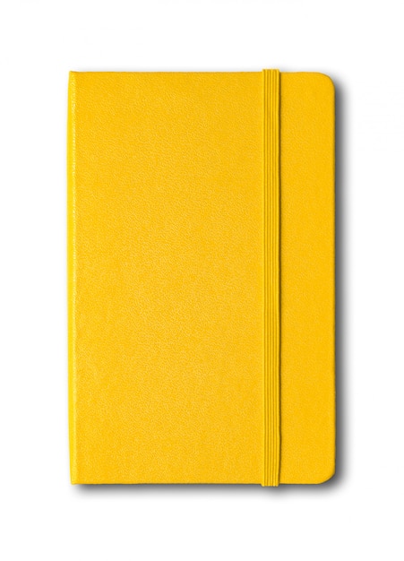 Yellow closed notebook isolated