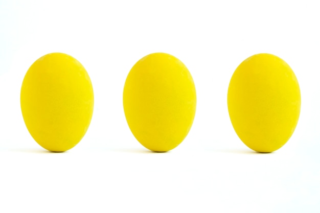 Premium Photo | Yellow color paint eggs