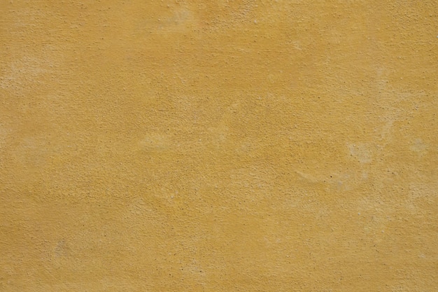 Yellow Concrete Wall Background.