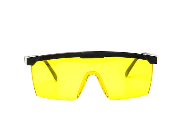 Yellow construction glasses isolated on white background