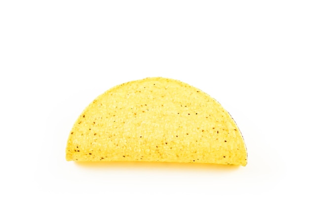 Yellow corn taco shells on a white background.