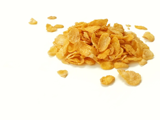 Yellow cornflakes isolated on a white background