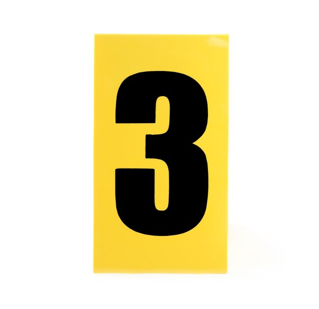 Photo yellow crime scene marker with number three on white background