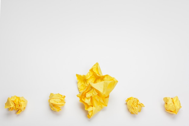 Yellow crumpled papers