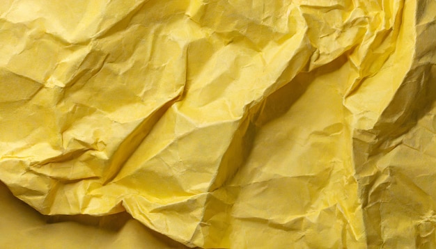 Yellow crumpled recycle paper texture background Craft paper