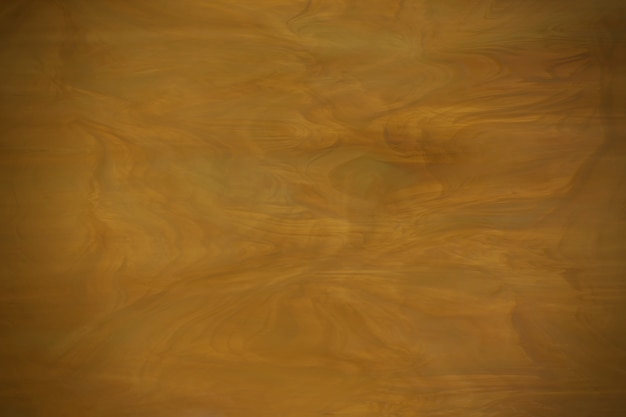 Photo yellow dark glass texture with vignetting. soft blurry focus.