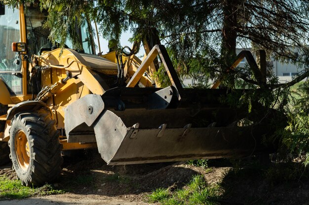 Photo yellow digger in the work