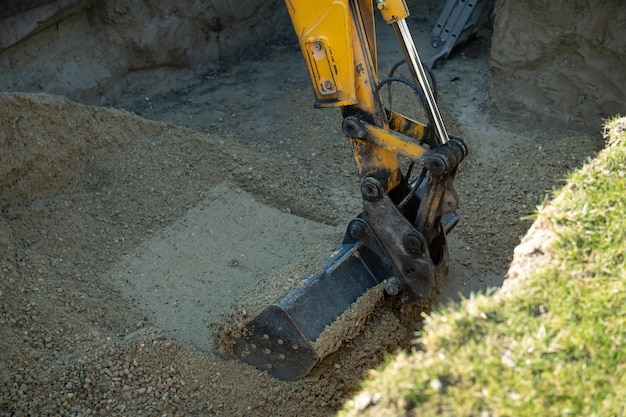 Yellow digger in the work