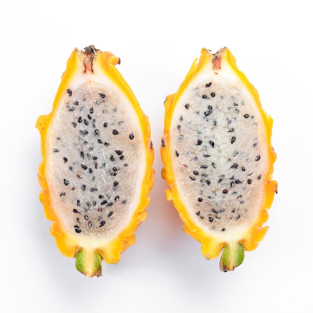 Yellow Dragon Fruit on a white wooden background. Pitahaya Tropical Fruits. Top view. Free space for text.