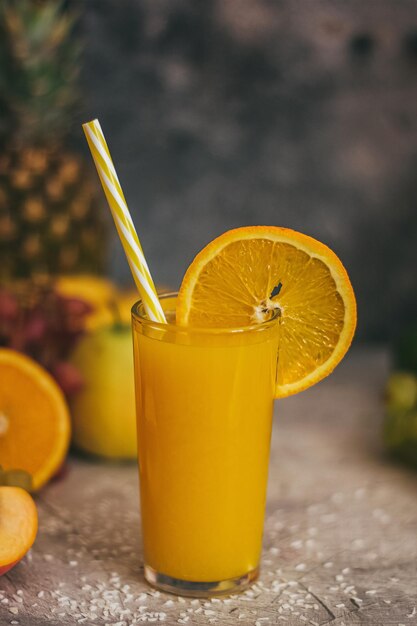 Yellow drink on glass table