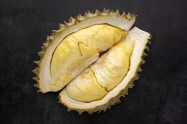 Yellow durian monthong flesh on dark texture background, king of fruits