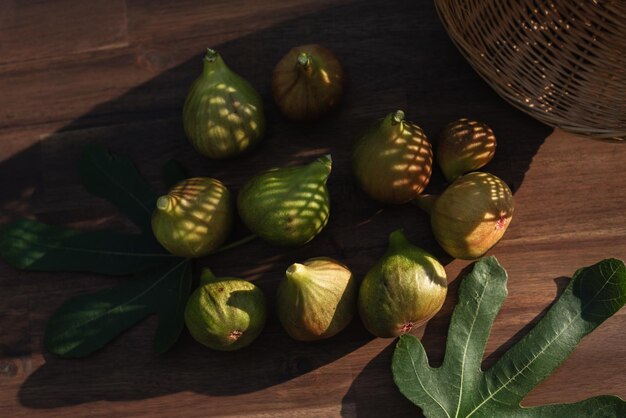 A yellow figs on an brown wooden background