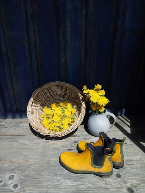 Yellow flowers and rubber boots