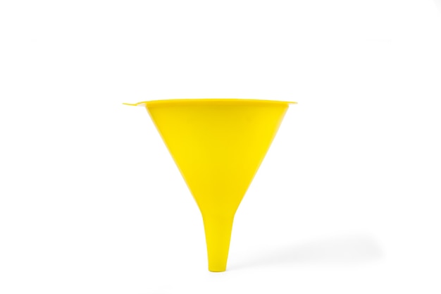 A yellow funnel in a cut out view