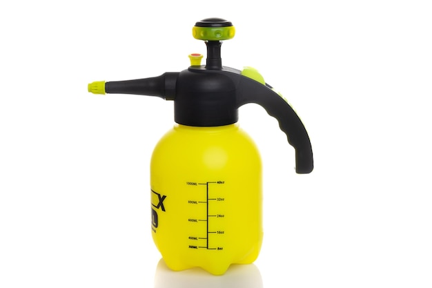 Yellow garden spray bottle sprayer on white background