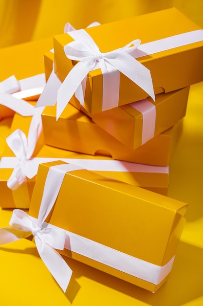 Yellow gifts on a yellow background