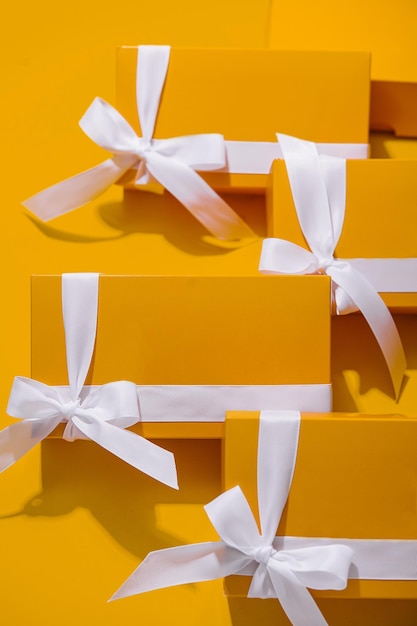 Yellow gifts on a yellow background