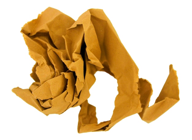 Yellow grainy sheet of packaging cardboard crumpled in a chaotic manner