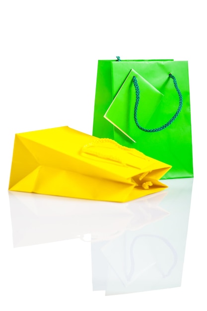 Yellow and green paper bag isolated