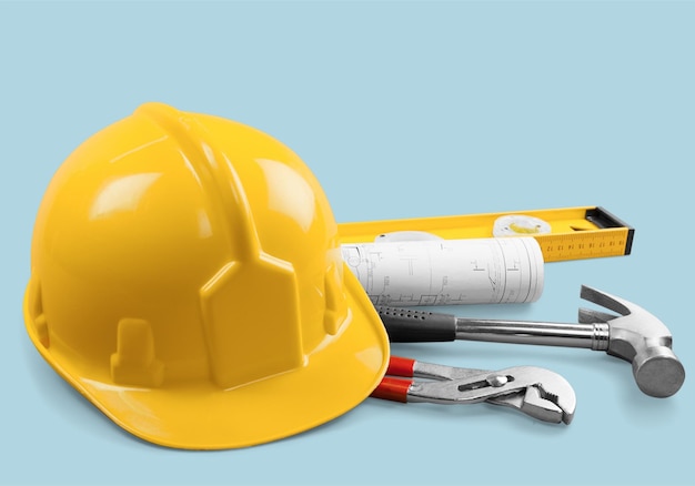 Yellow helmet with equipment on  background