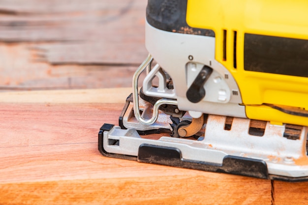 The yellow jigsaw for wood working.