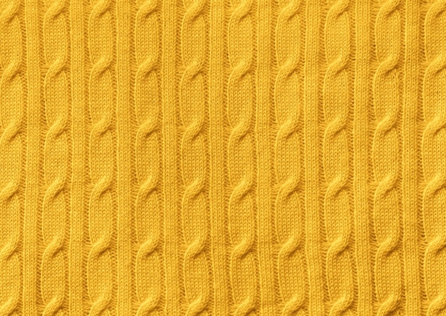 Photo yellow knitted fabric background texture