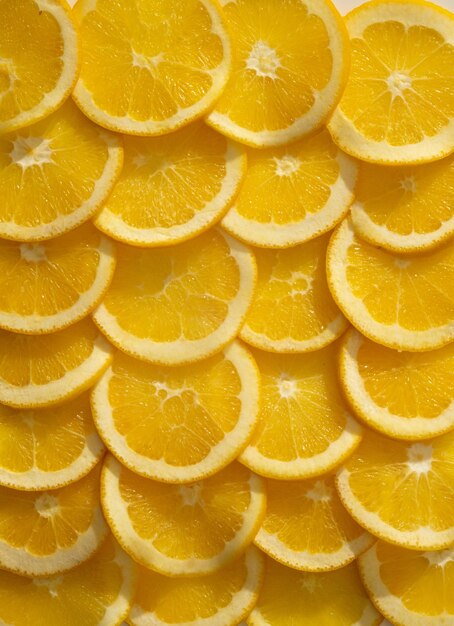 Yellow lemon slices pattern texture background cute wallpaper for summer healthy drink