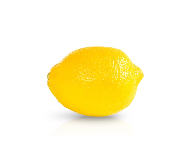 Yellow lemon on a white wall isolated with shadow