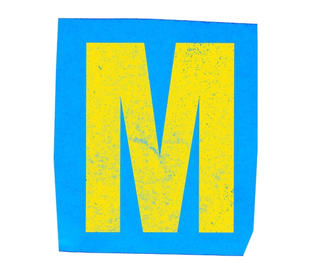 yellow letter m on blue paper tear