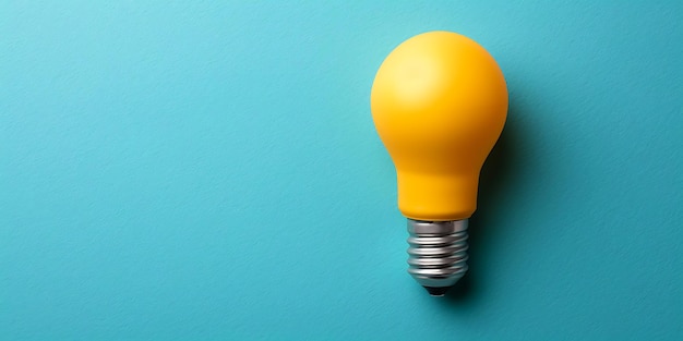 a yellow light bulb with a blue background