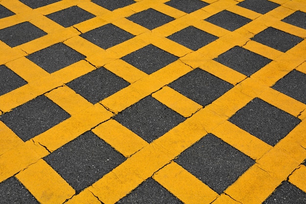 Yellow line on asphalt road background