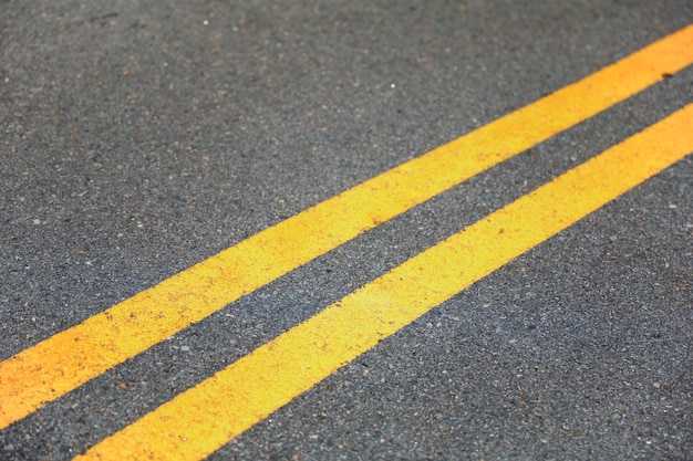 Yellow lines on streets symbolize traffic separation caution and no parking zones enhancing road