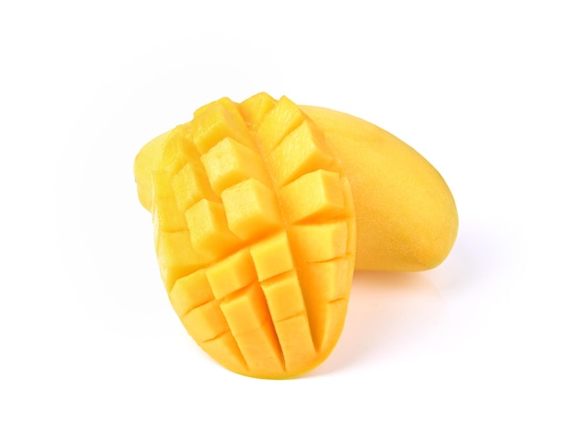 Yellow mango and slice isolated on white background