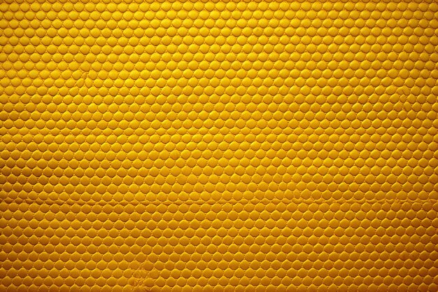 Photo yellow metal background or texture and gradients shadow abstract pattern