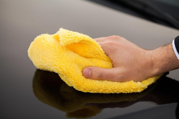 Yellow microfiber for wiping dust in the car