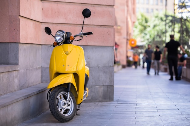 Yellow motor bike in street