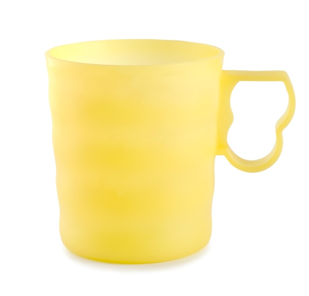 写真 白い背景で隔離の黄色いマグカップ