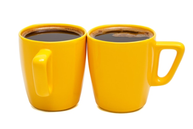 Yellow mugs of coffee