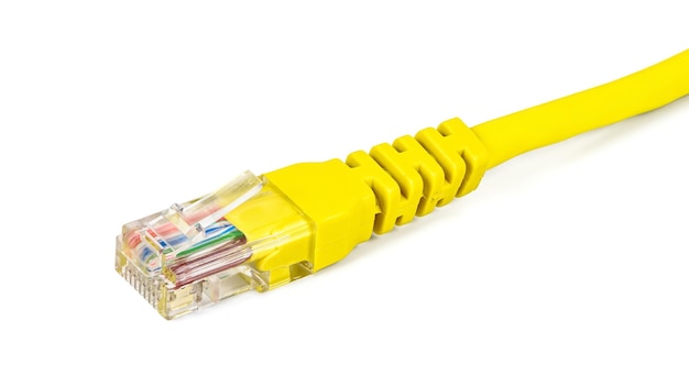 写真 白い背景の上の黄色のネットワーク プラグ
