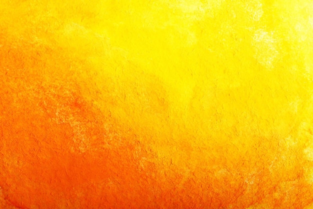 Foto uno sfondo giallo e arancione con una trama di una trama ad acquerello