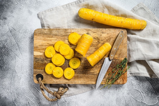 Yellow organic carrots on a table