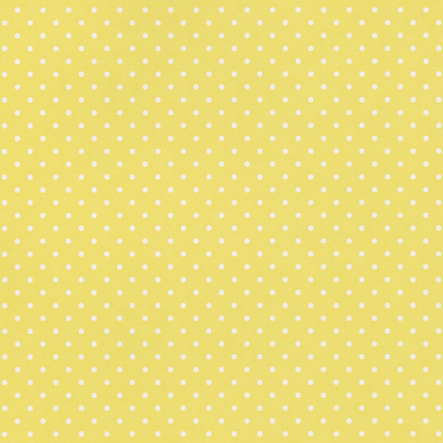 Photo yellow paper background with white pattern